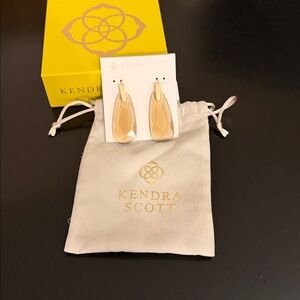 Kendra Scott Smokey Gold Earrings, with pouch and box. New in package.
